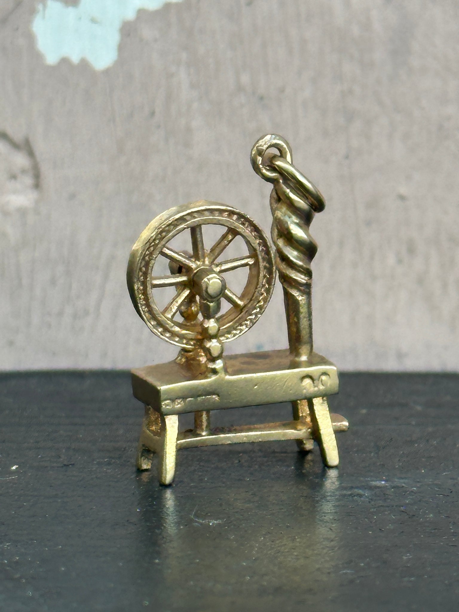 Spinning Wheel Charm