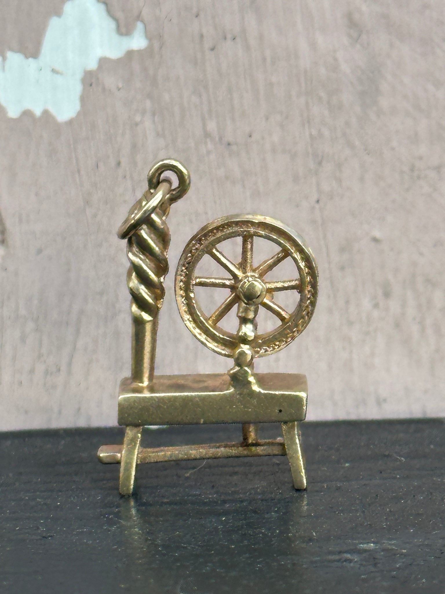 Spinning Wheel Charm