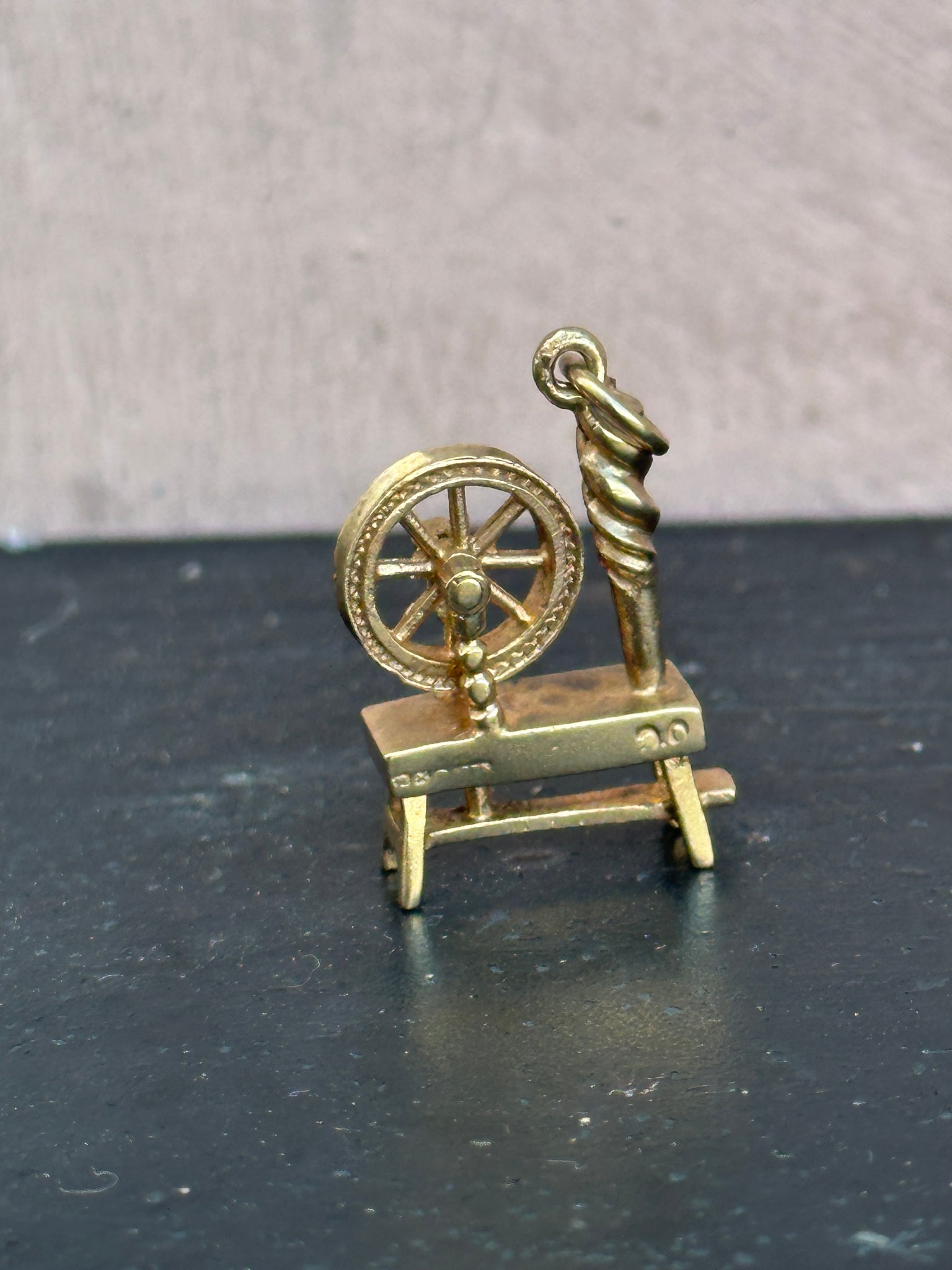 Spinning Wheel Charm