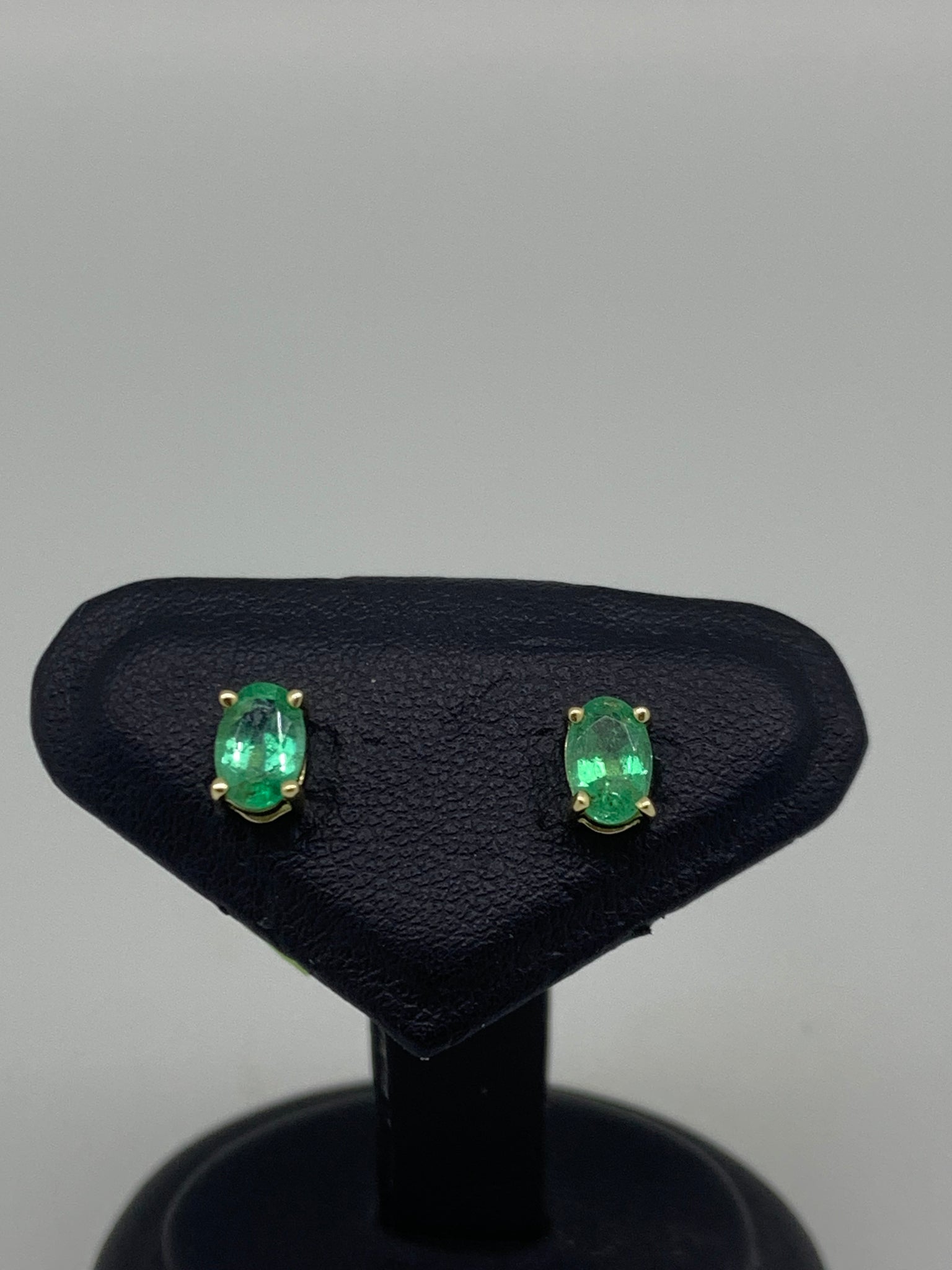 Yellow Gold and Oval Emerald Claw Stud Earrings