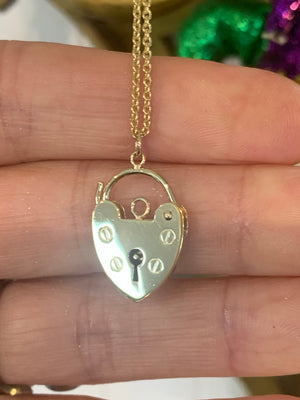 Heart shaped padlock on chain